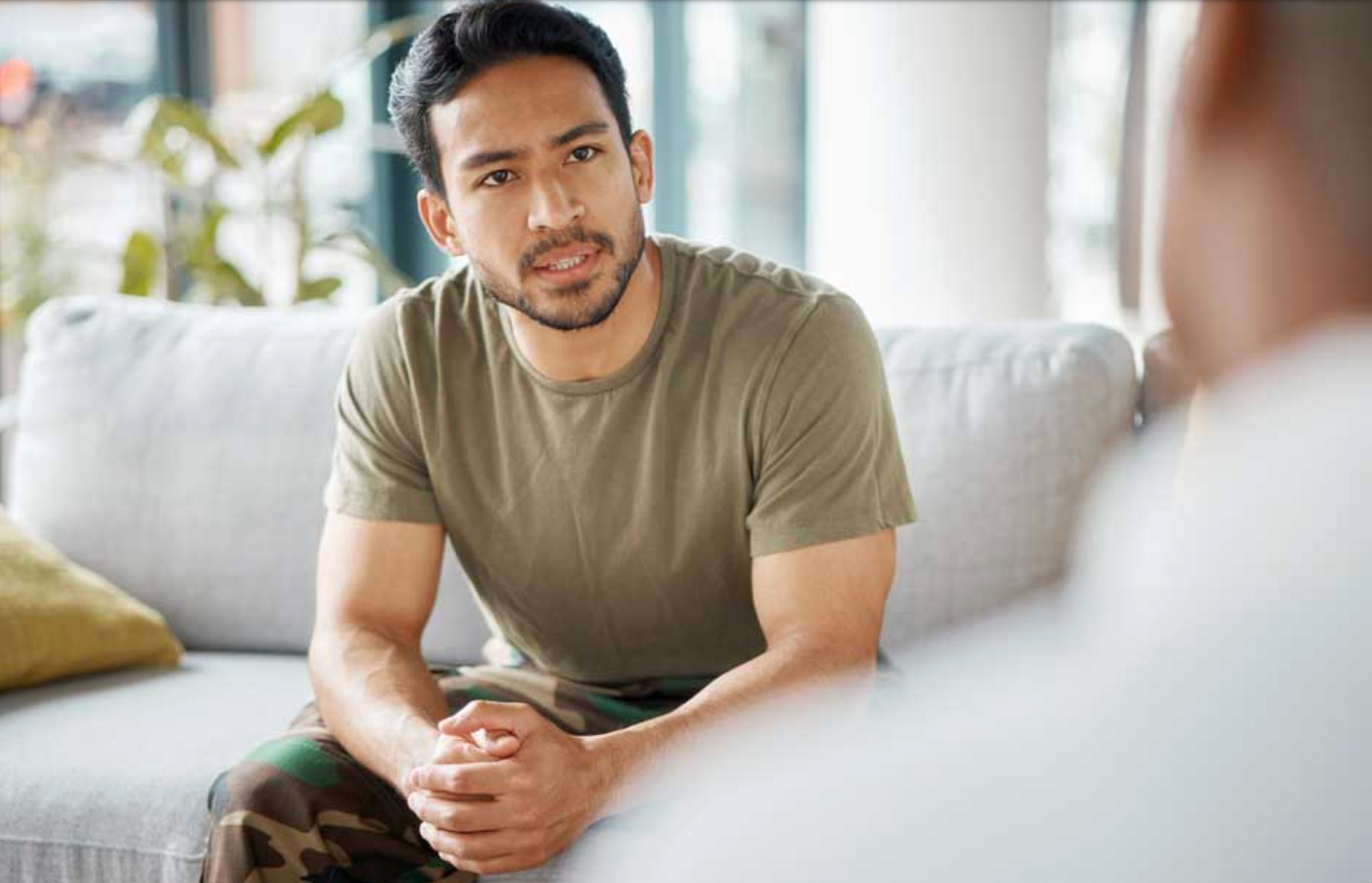 A client speaking with a counselor